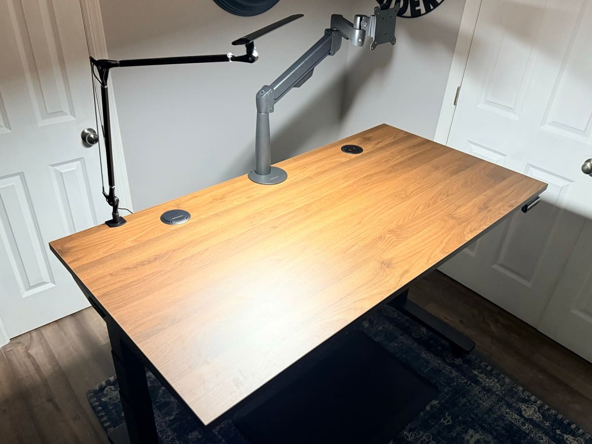 Range-X monitor arm and E7 lamp on the V3 desk