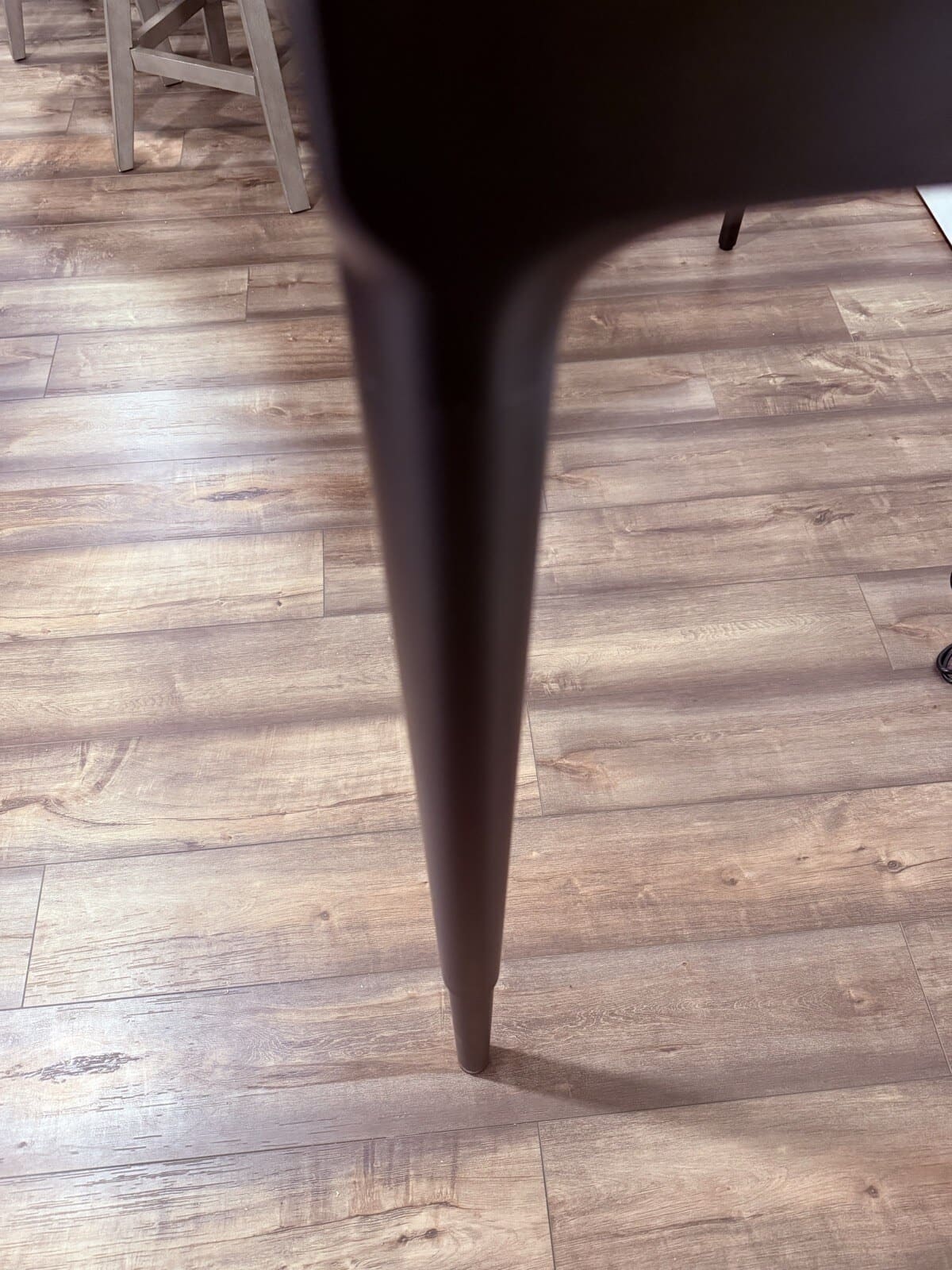 Parsons tapered leg close-up showing furniture-style design