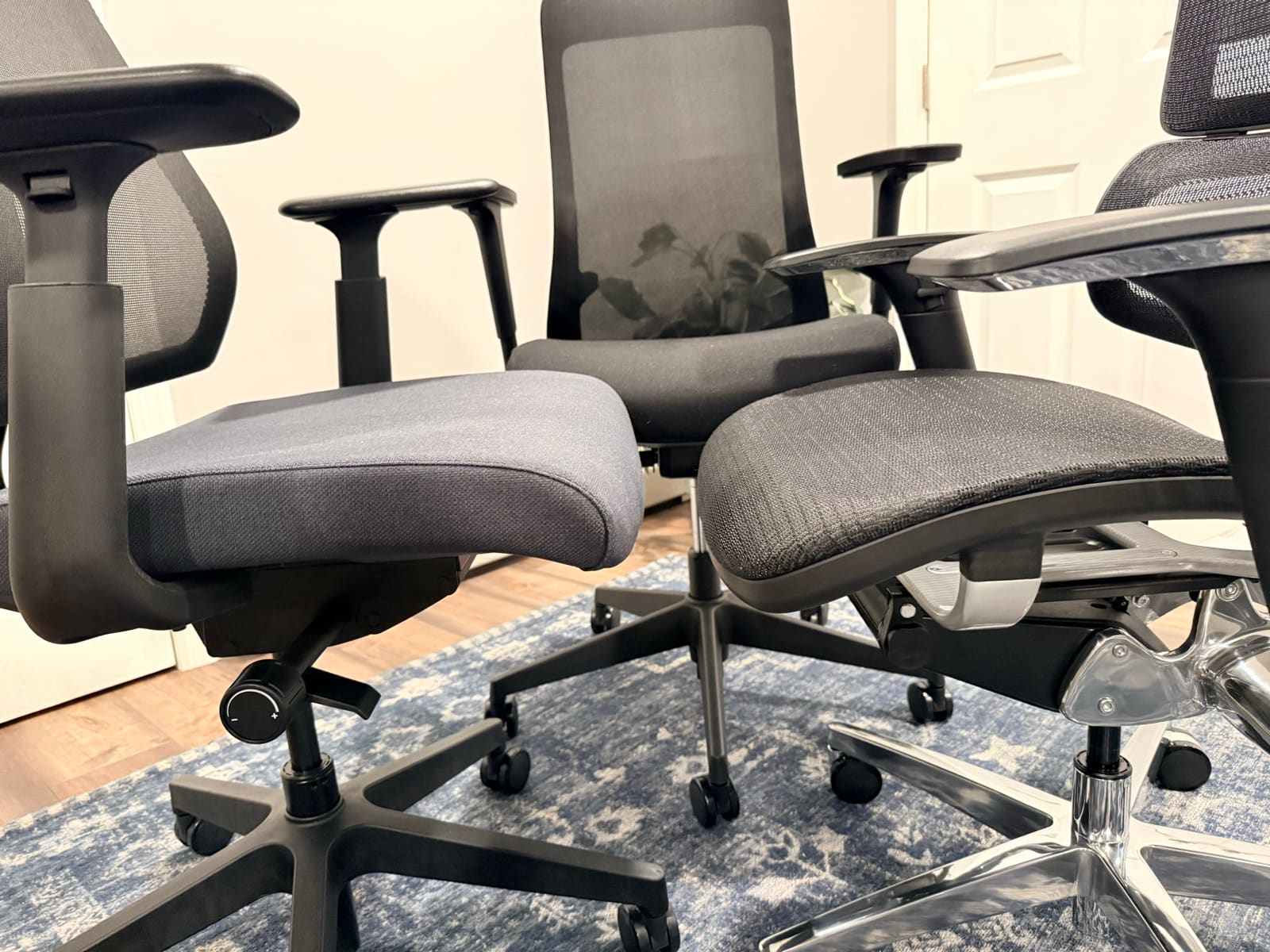 Close-up comparison of seat edges across all three UPLIFT chairs