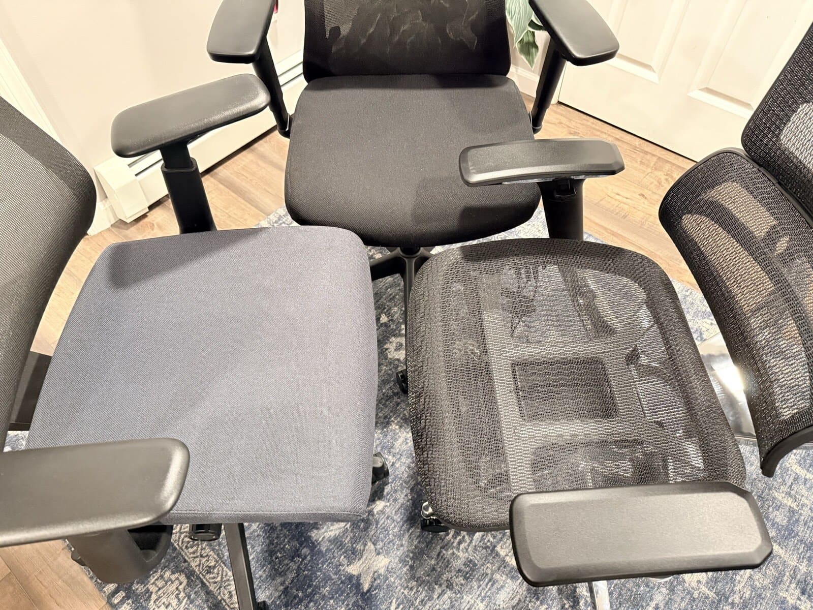 Three UPLIFT chair seats from above: Bolan fabric, Clarksville foam, Intuition full mesh