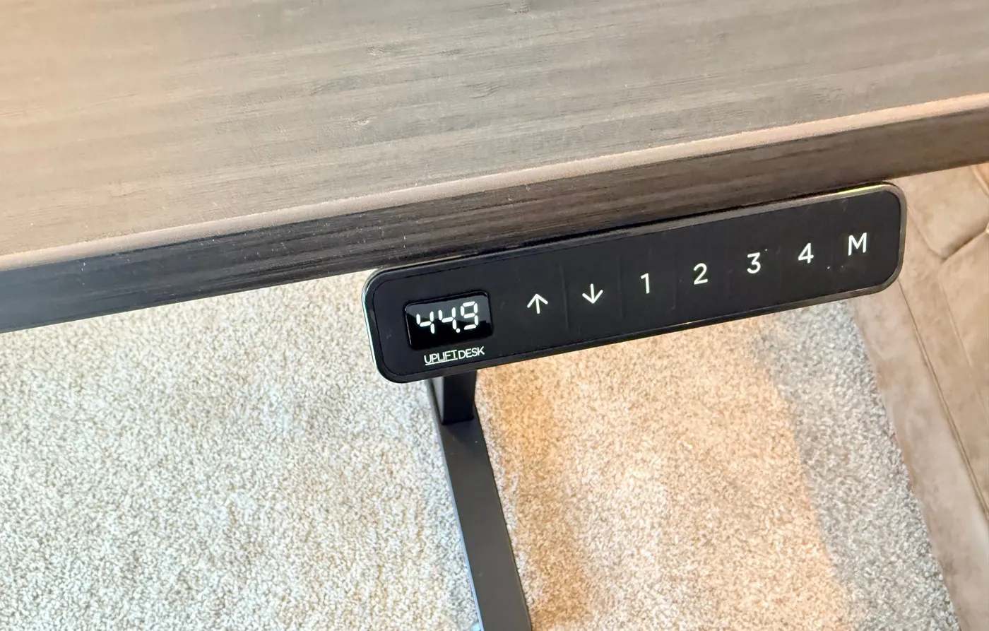 UPLIFT keypad showing 44.9 inches at standing height, near the top of the V3 frame's 22.6 to 48.7 inch travel range