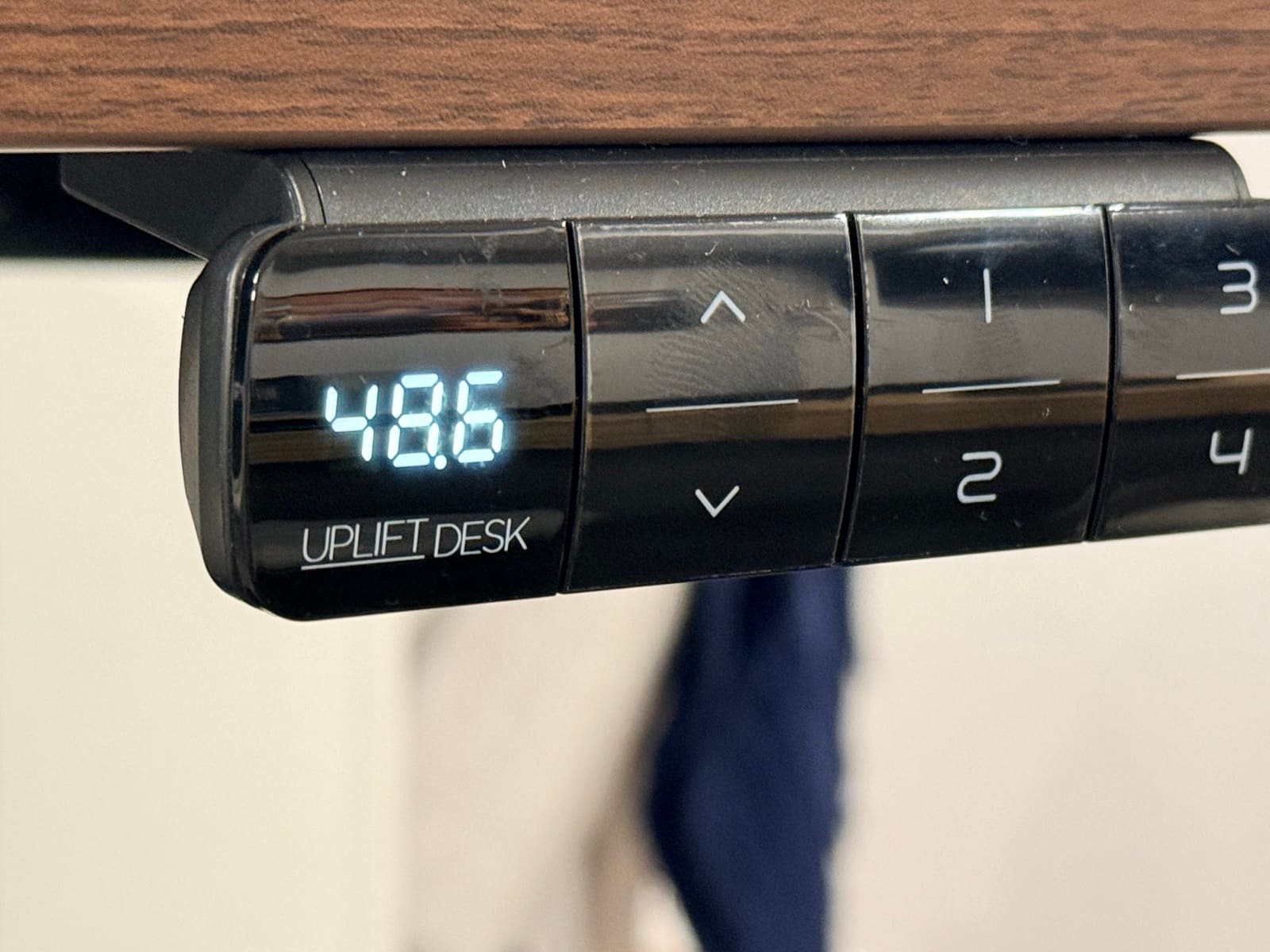 Keypad display showing 48.6 inches at standing height