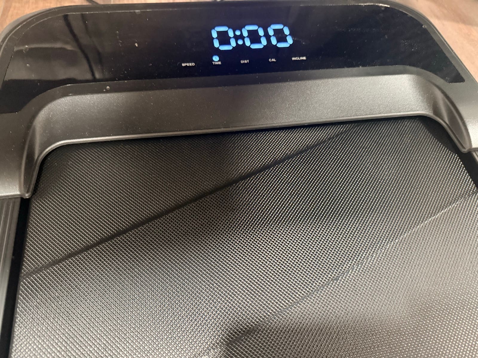 Close-up of the LED display showing speed, time, distance, calories, and incline labels