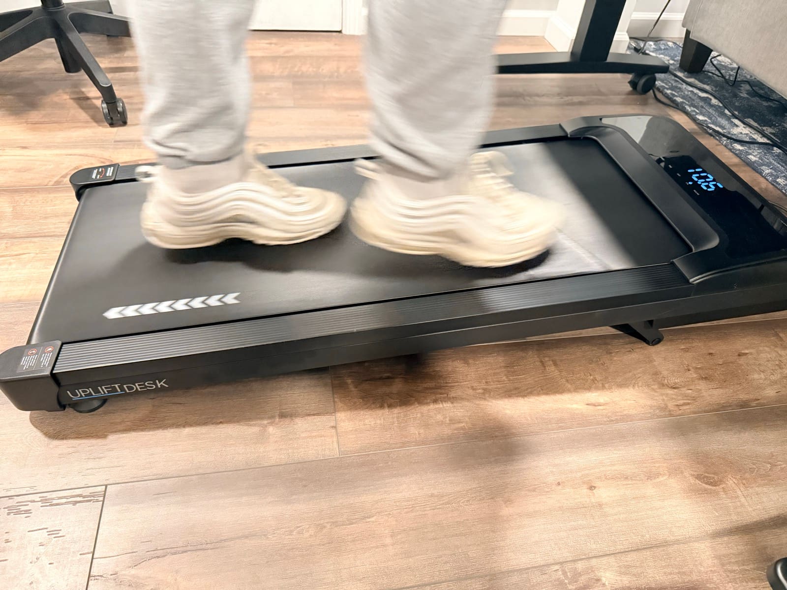 Action shot of feet on the walking pad in motion