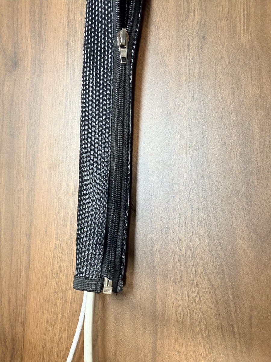 Close-up of cable routing before and after sleeve installation